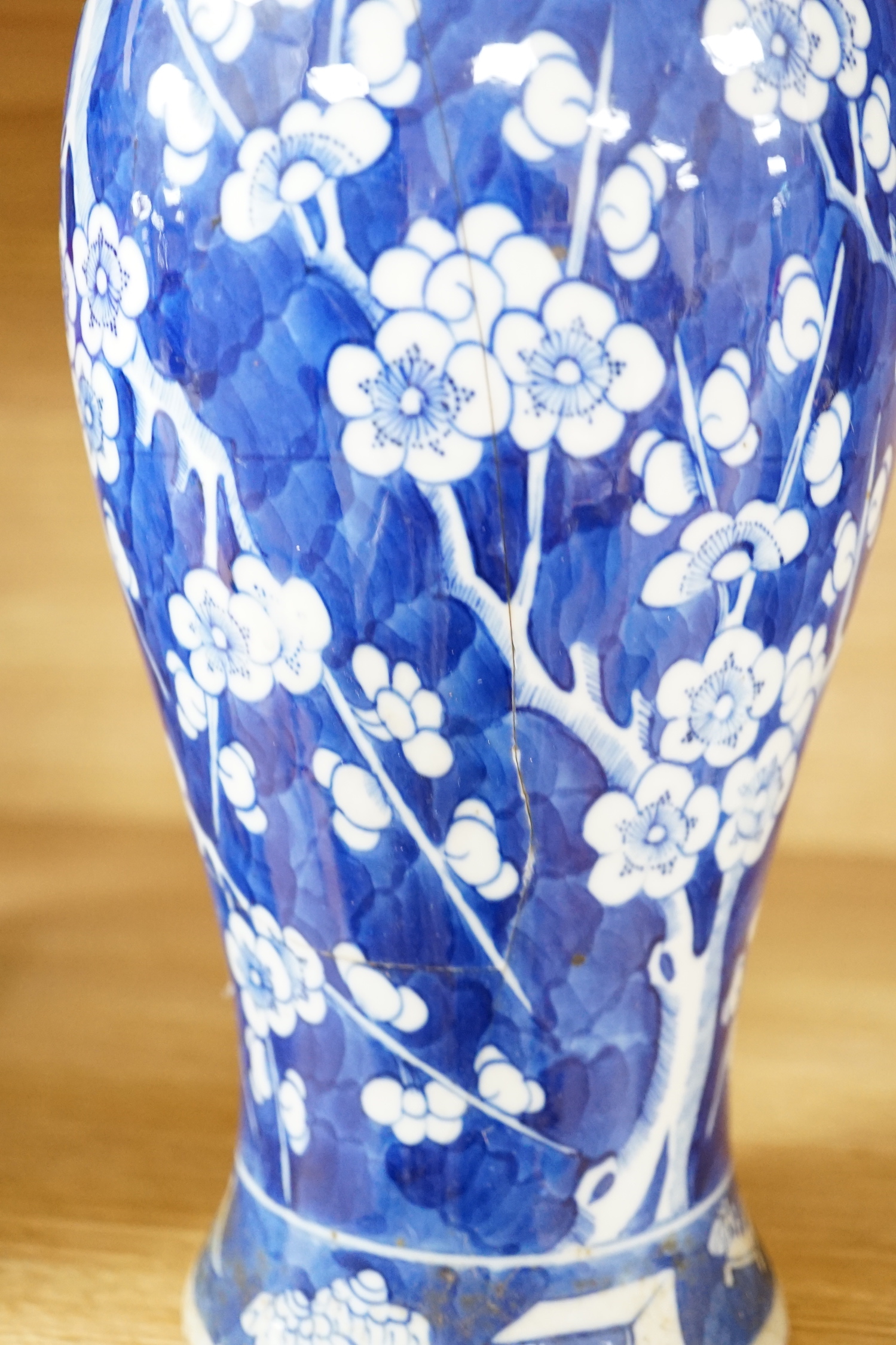 A Chinese prunus vase, a smaller vase and three rice bowls, prunus vase 30cm high